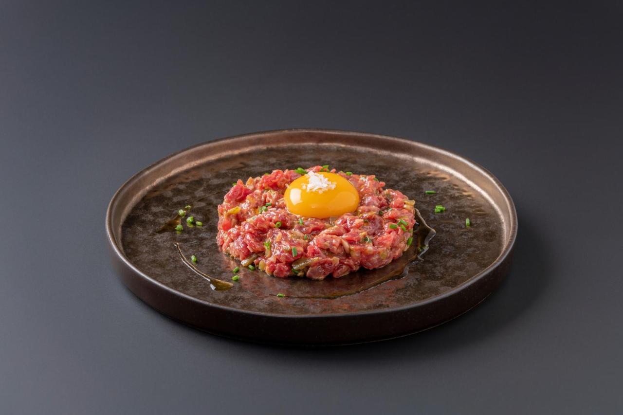 Eurostars Portico アリカンテ エクステリア 写真 A plate of tartar